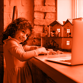 Young girl enjoying interactive educational activities in nursery using Mazaya Rawdah system